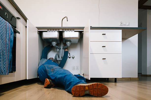 Professional Drain Cleaning technician working in Edgewater, NJ
